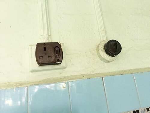 Old light switch and power socket